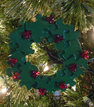 wreath christmas ornament made from puzzle pieces